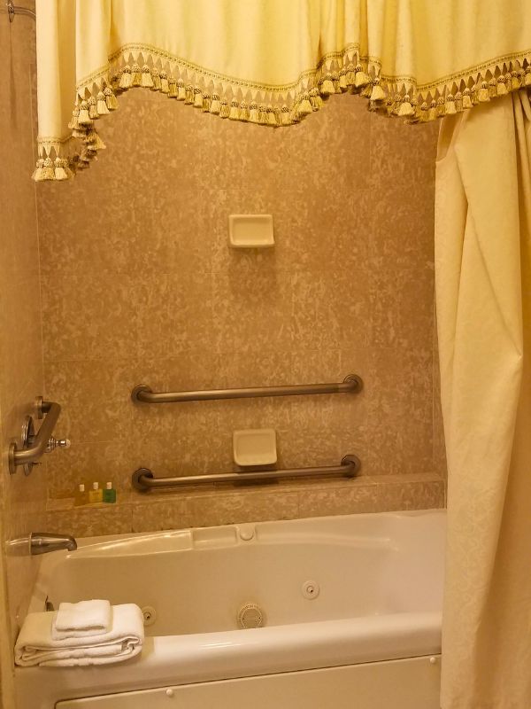 The tub shower combo in a Biltmore Inn room